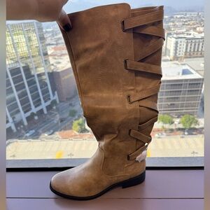 Brown tall boots.